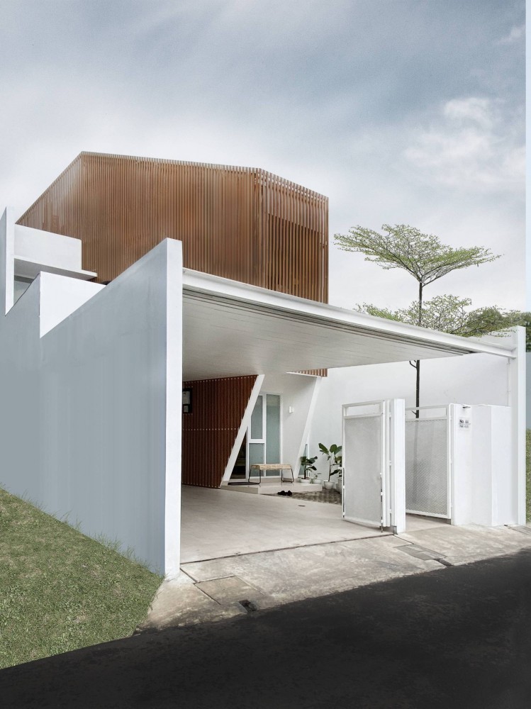 Семейный дом с динамичной и цельной композицией внутренних и внешних пространств