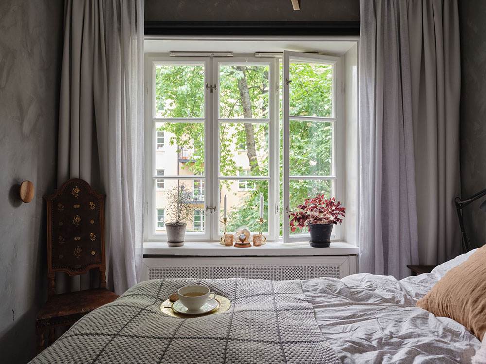 Компактный и уютный интерьер с винтажным декором в Швеции